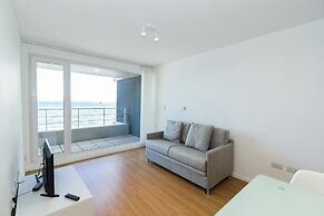De la Costa Apartamento