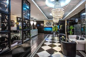 Loumage Hotel & Suites