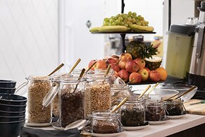 GLEMM by AvenidA Superior Hotel & Residences