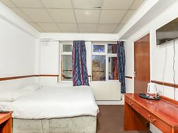 OYO VII Hotel & Indian Restaurant