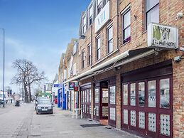 OYO VII Hotel & Indian Restaurant