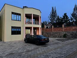 The Mugabi's Spacious Private Room