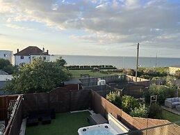 Broadway Beach Homes Airbnb With Hot tub