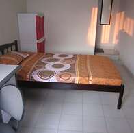 SPOT ON 91343 Kartika Guest House SyariahNearPantai Stres