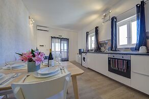 Tritoni harbour suites