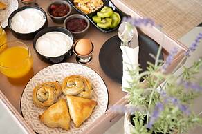 Ebenus Suites by Checkin