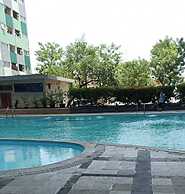 THE ROOMOS Hotel Apartemen