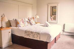 Gregory by the Warren Collection