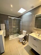 Live Laugh Love Beach Guest Home with AC