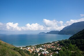Pé na areia com charme e elegância
