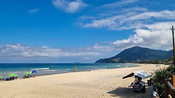 Pé na areia com charme e elegância