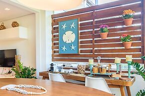 Pé na areia com charme e elegância