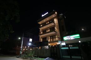 Treebo Nearmi Bell House