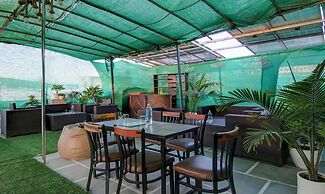 Treebo Nearmi Bell House