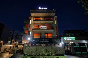 Treebo Nearmi Bell House