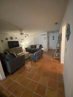 Tropical Theme Home Steps from the Beach