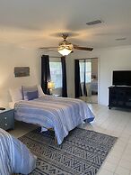 Tropical Theme Home Steps from the Beach