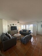 Tropical Theme Home Steps from the Beach