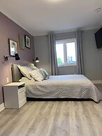 Ambiance by the Falls Cozy Suite