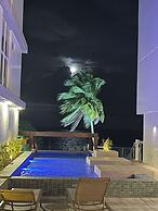 Pé na areia do Caribessa - Branco Haus