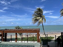 Pé na areia do Caribessa - Branco Haus