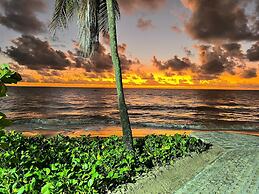 Pé na areia do Caribessa - Branco Haus