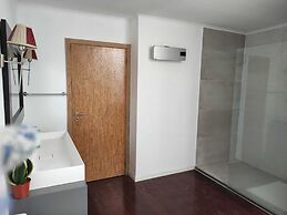 Caruma Surf Hostel & Suites