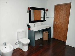 Caruma Surf Hostel & Suites