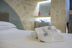 Vico Bianco Raro Rooms Collections