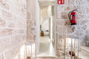 Vico Bianco Raro Rooms Collections