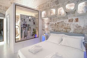 Vico Bianco Raro Rooms Collections