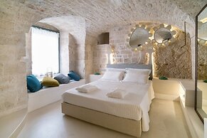 Vico Bianco Raro Rooms Collections