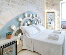 Vico Bianco Raro Rooms Collections