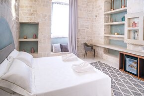 Vico Bianco Raro Rooms Collections