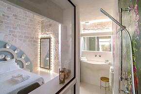 Vico Bianco Raro Rooms Collections