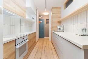 Kraszewskiego Apartment by Renters
