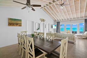 Beachfront White Palm Villa - Tar Bay