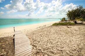 Beachfront White Palm Villa - Tar Bay