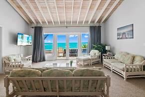 Beachfront White Palm Villa - Tar Bay