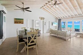 Beachfront White Palm Villa - Tar Bay