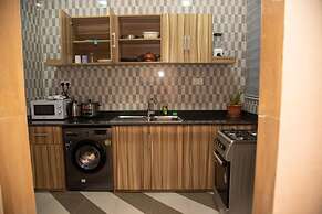 Captivating 1-bed Apartment in Tema, com 25