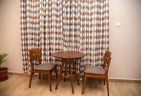 Captivating 1-bed Apartment in Tema, com 25