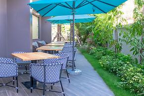 GLOW Mira Karon Beach