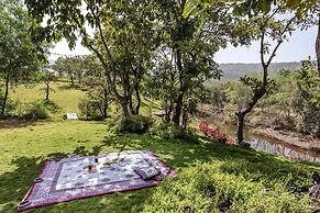 The Lazy River Cottage by cosmicstays