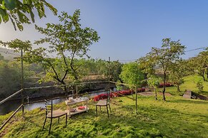 The Lazy River Cottage by cosmicstays