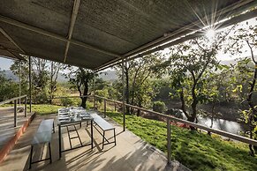 The Lazy River Cottage by cosmicstays