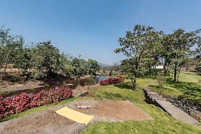 The Lazy River Cottage by cosmicstays