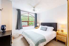 Cozy Creekside Two-Storey Condo