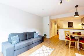 Cozy Creekside Two-Storey Condo