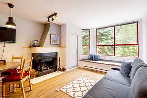 Cozy Creekside Two-Storey Condo
